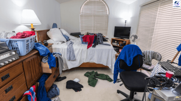 Messy and unorganized room with clothes everywhere